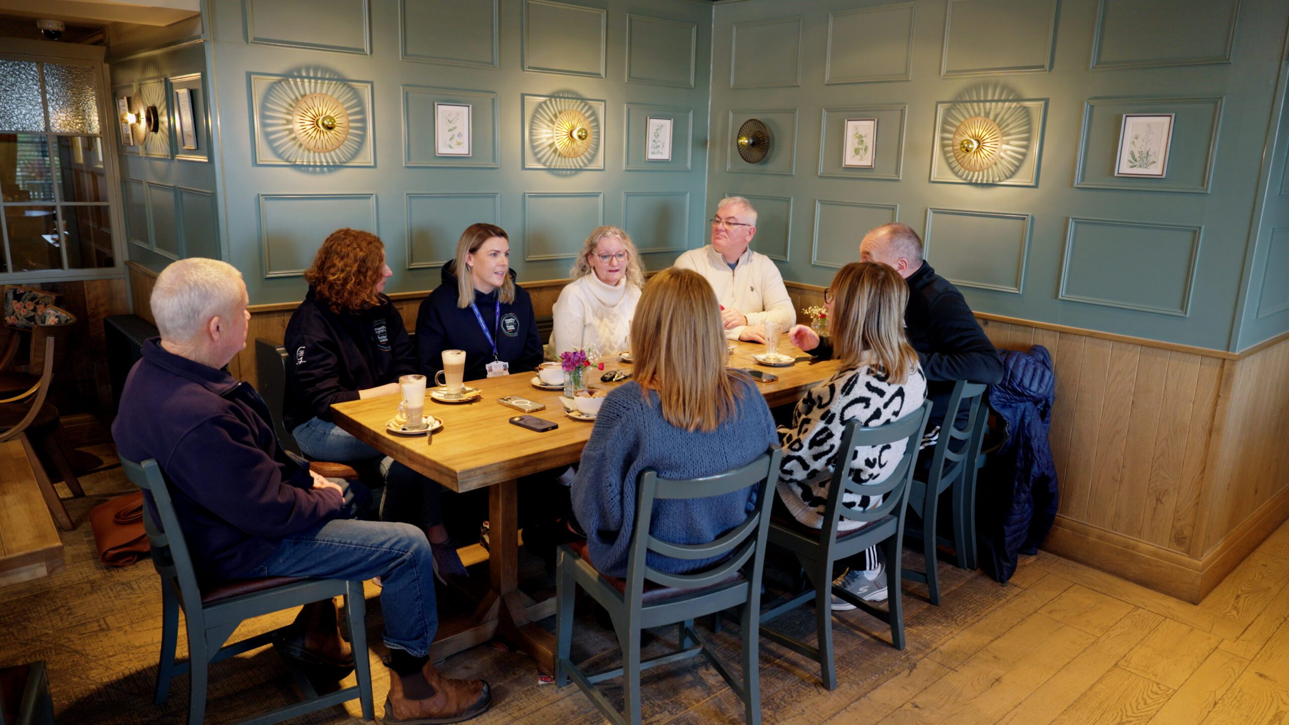 a group of foster carers around a table